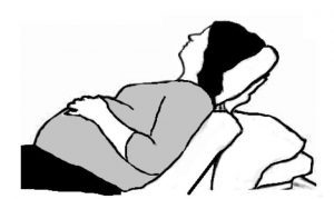 A pregnant woman in the semi reclining position